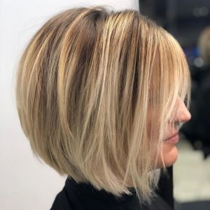 Discover layered bob haircuts for women over 50 with fine hair